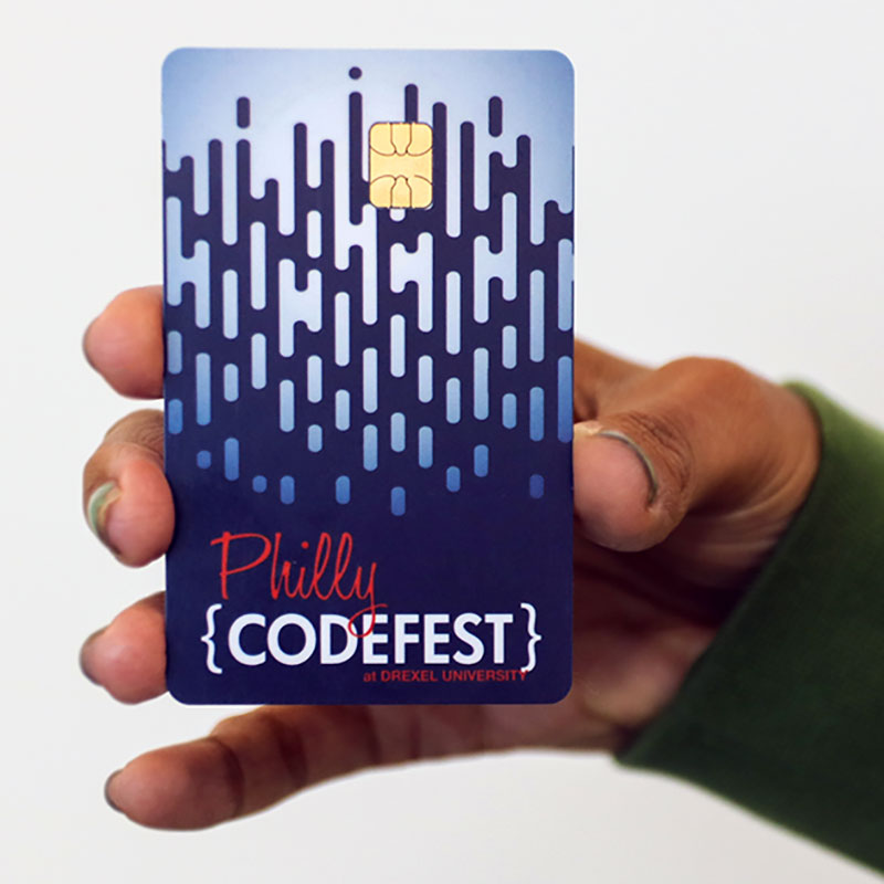 Image of hand holding Philly Codefest branded CyberONE card