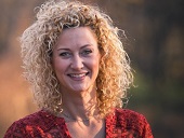 Brandy-Joe Milliron, PhD outdoors in sunlight