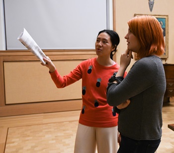 Caroline Shi '20 and Katrina Carroll-Haskins, Drexel PhD student, looking at art at the Barnes