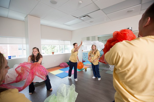 CNHP nursing students using scarves in a dance/movement therapy class