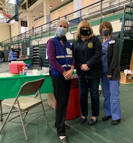 Vaccination Clinic at Mercer County Community College. From left to right: Ellen Giarelli, RN EdD, Drexel University, Stephanie Mendelsonn, Medical Reserve Corps Chris Sntoro, NJ Department of Health