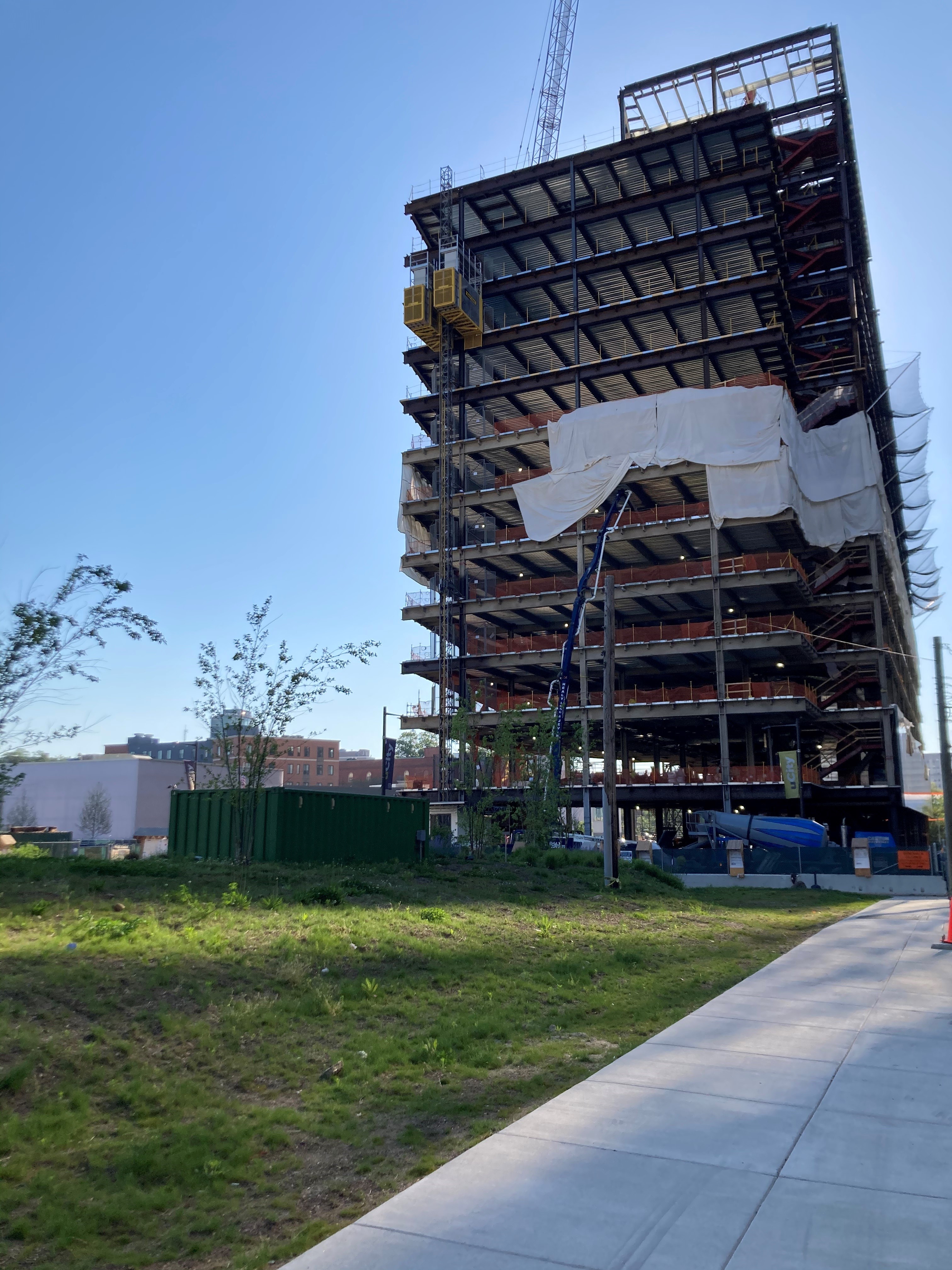 Cement trucks ready to start pouring concrete floors of the new building.