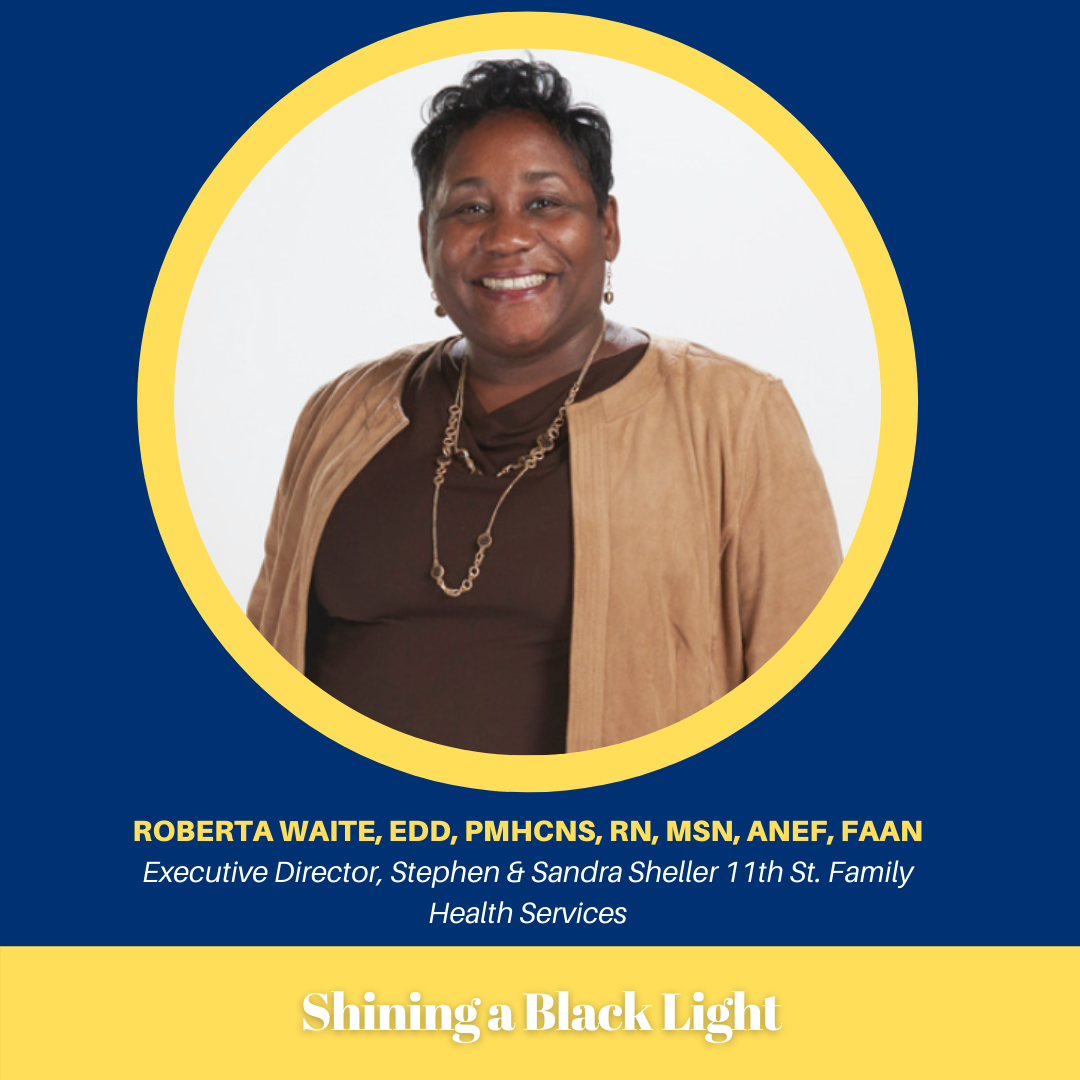 Roberta Waite Headshot in Shining A Black Light Frame