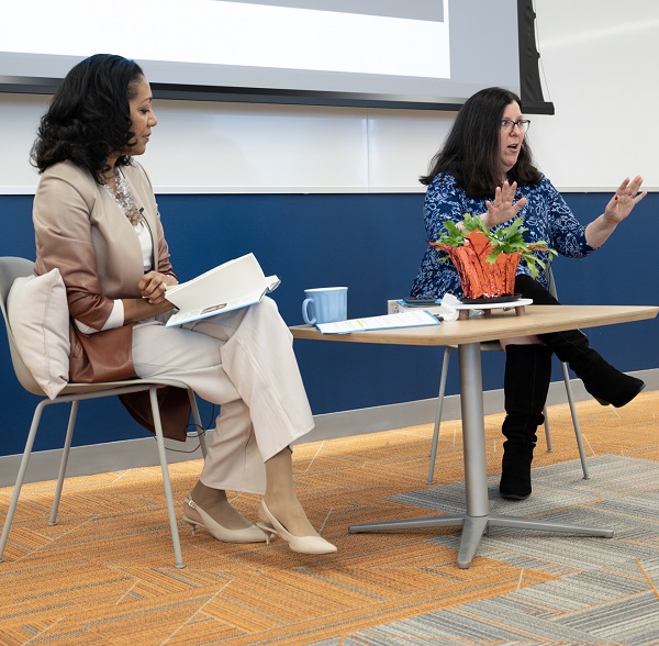 Veronica Carey, PhD, assistant dean for Diversity, Equity and Inclusion (seated on the left) and Marybeth Gasman, PhD, author of Doing the Right Thing: How Colleges and Universities Can Undo Systemic Racism in Faculty Hiring (seated on the right) having a discussion about Gasman's book.
