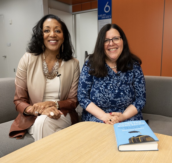 Veronica Carey, PhD, assistant dean for Diversity, Equity and Inclusion (seated on the left) and Marybeth Gasman, PhD, author of Doing the Right Thing: How Colleges and Universities Can Undo Systemic Racism in Faculty Hiring (seated on the right) having a discussion about Gasman's book.
