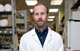 Ben Binder-Markey in lab coat