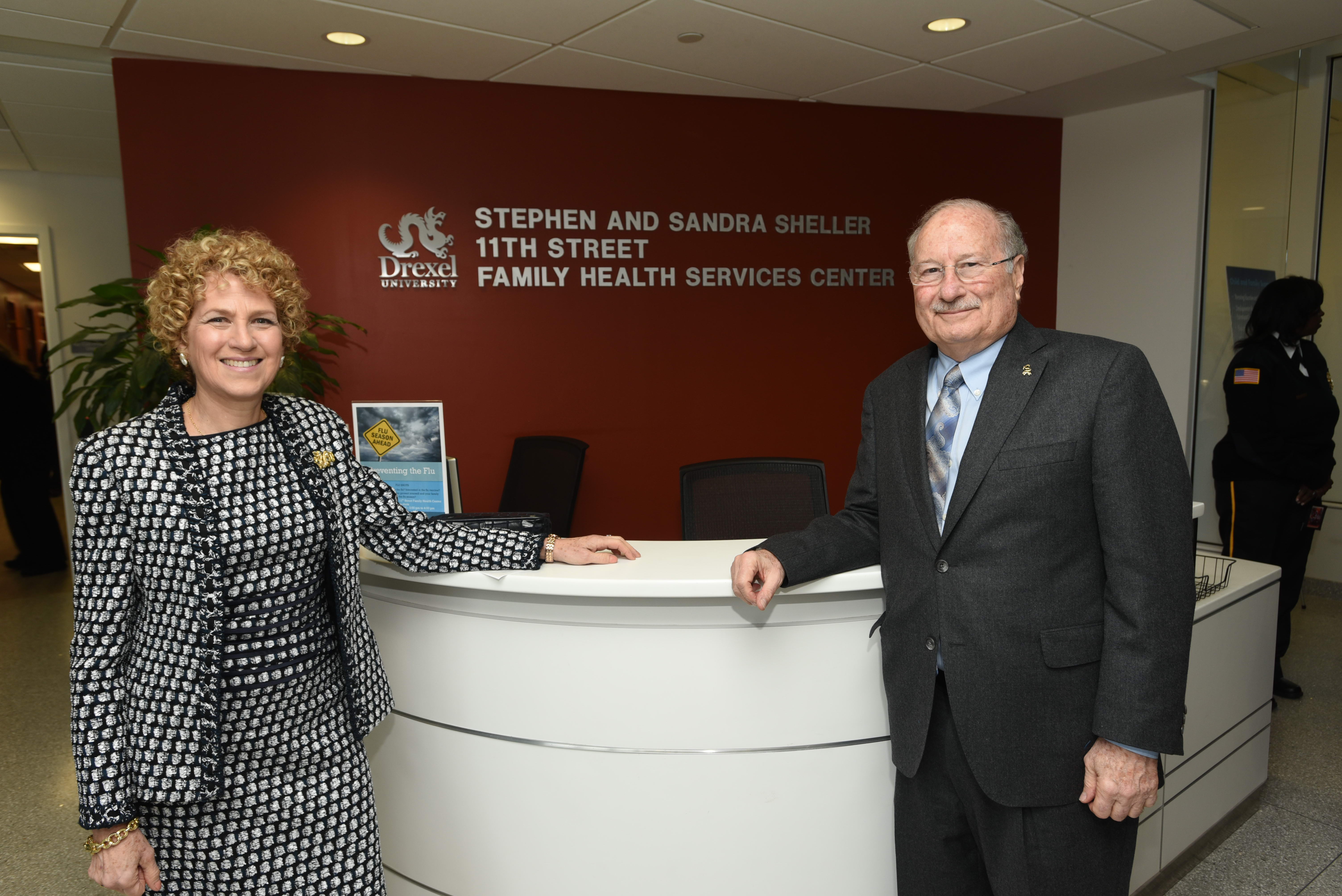 Sandra and Stephen Sheller at reception desk