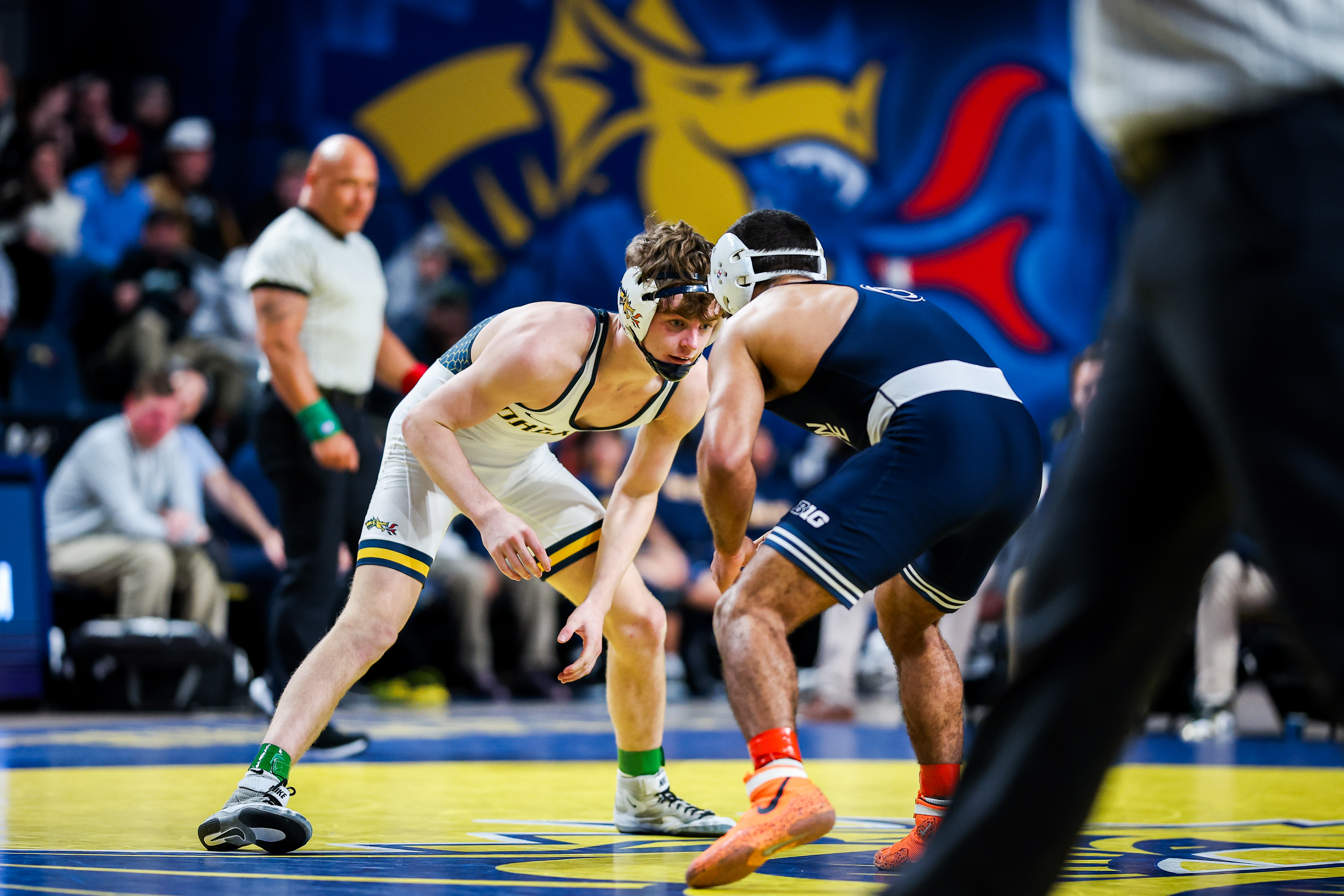 Nursing student Patrick Kelly facing off at a Drexel wrestling match