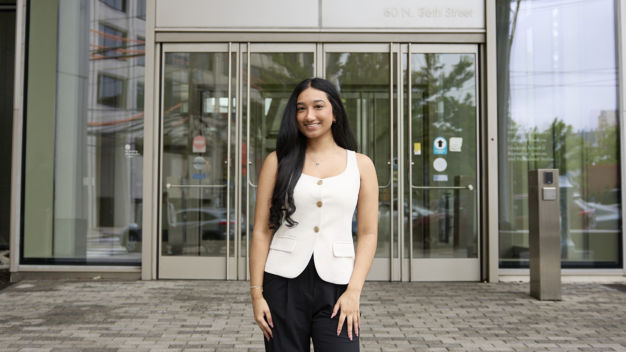 Jessica Poovathinkal in front of HSB