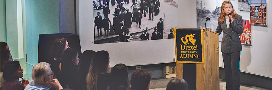 Alumni of the Drexel University College of Arts and Sciences attend a lecture on 'Sustaining Philadelphia' in 2015