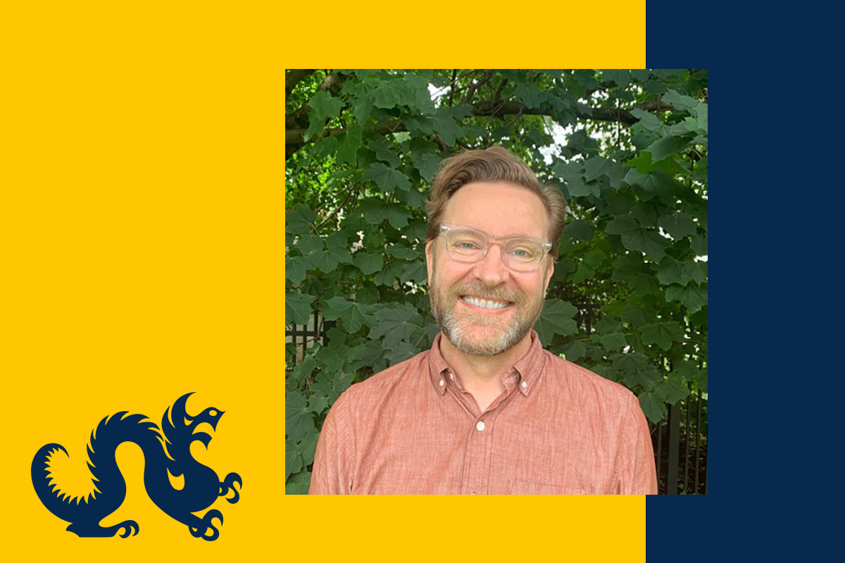 Photo of Brad Nabors on a blue and gold Drexel background