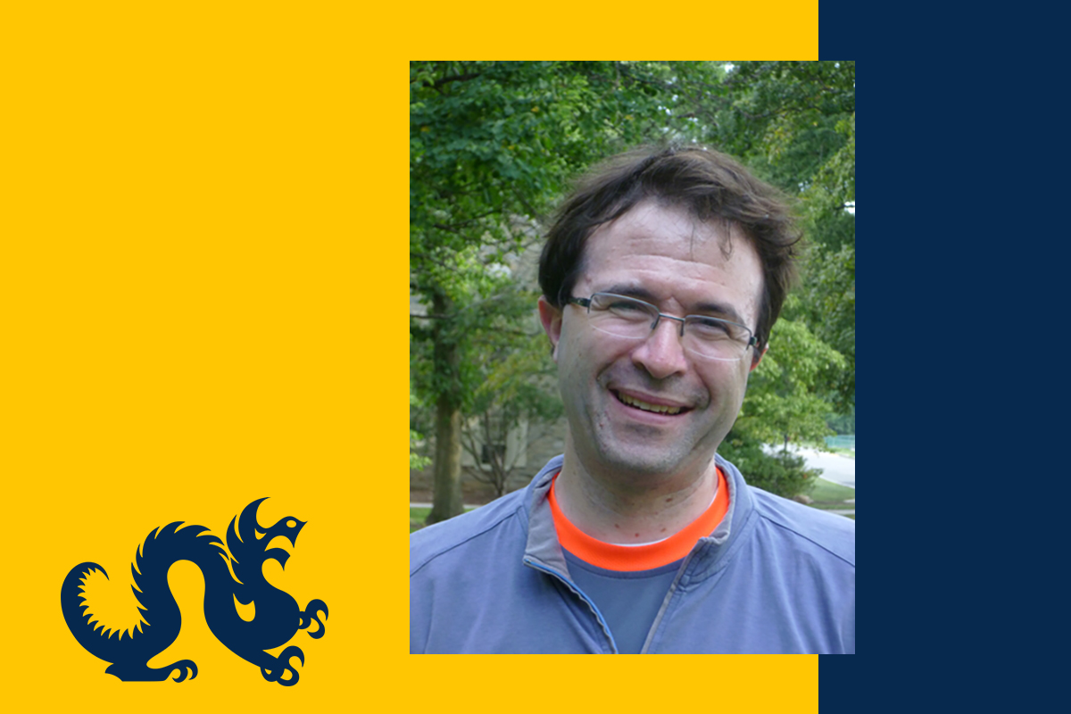 Photo of Jesse Goldman on a blue and gold Drexel themed background