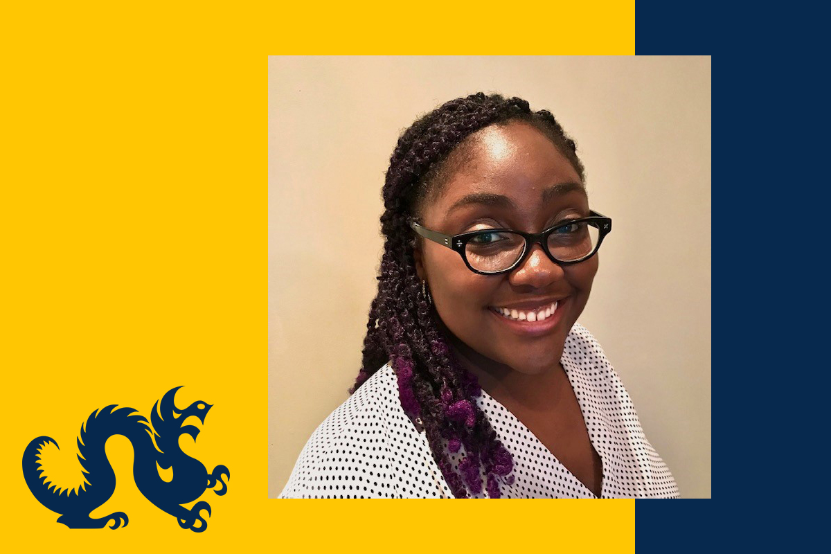 Headshot of Keisha April on blue and gold Drexel background