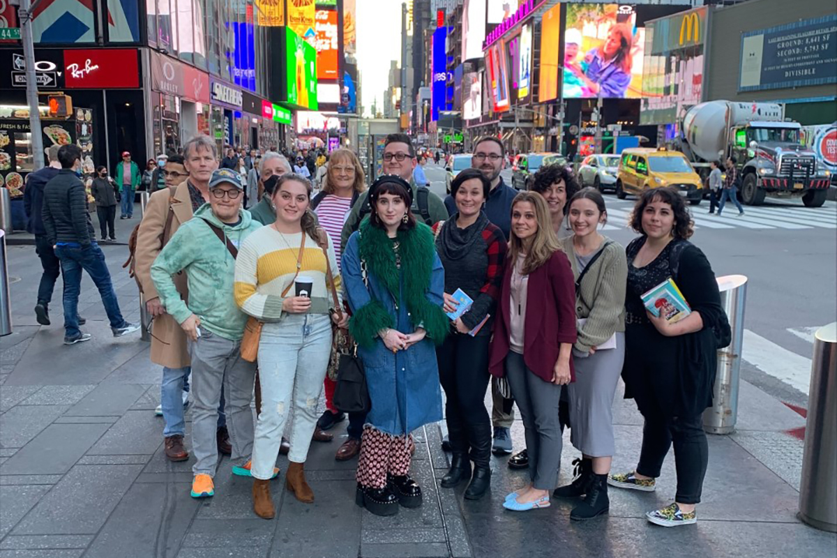 MFA students pose for a photograph in Times Square