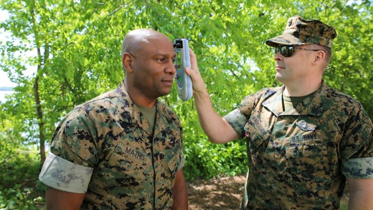 Chief Hospital Corpsman Jared Anderson uses Infrascanner