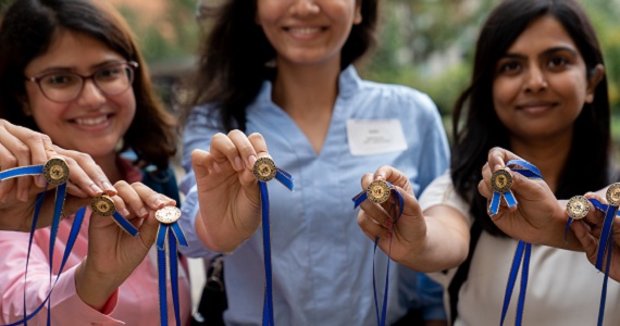 New students at Dornsife receive a pin that reads "Public Health, Human Rights"