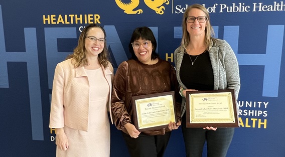 Dornsife Dean Gina Lovasi with 2026 alumni award winners