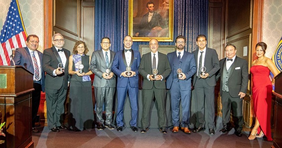 Dean Diez Roux and honorees hold their awards