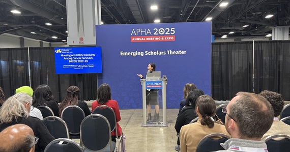 PhD student Tina Nguyen presenting at the APHA