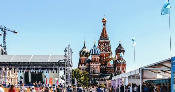 people walking near st. basils cathedral in moscow