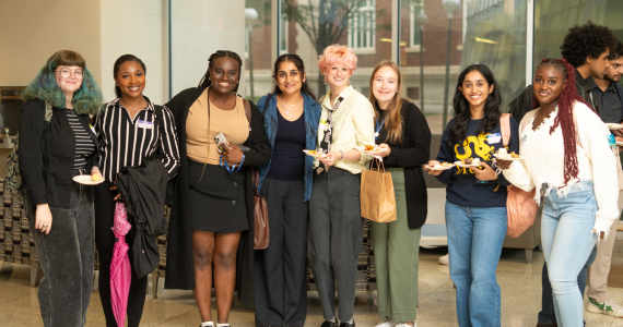 New students gather for a group photo in Chapman Court after the Pinning Ceremony