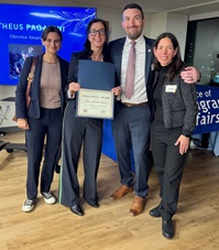 the Latino Health Collective (LHC) accepting the Philadelphia Office of Immigrant Affairs Health & Wellness Achievement