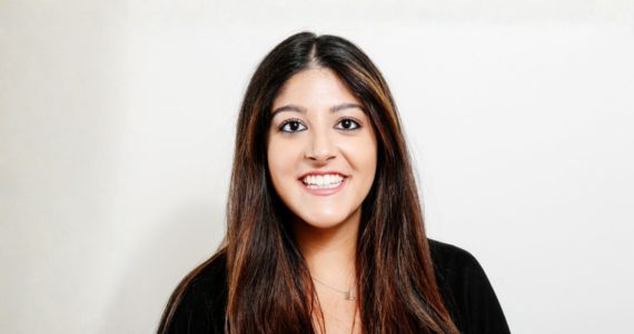 Headshot of alum Elina