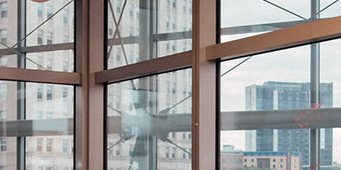 Looking out windows at building