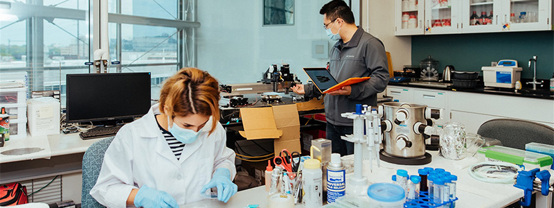 Researchers working in an engineering lab