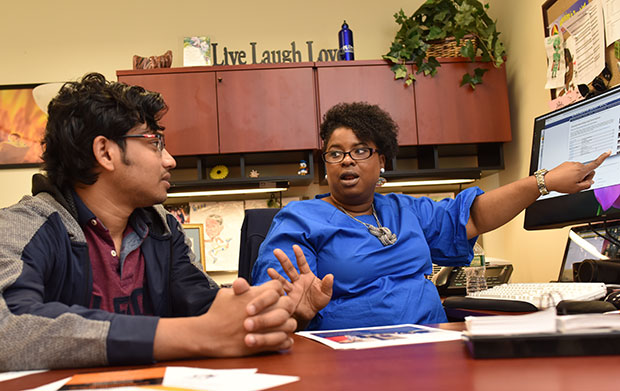Engineering student meets with advisor