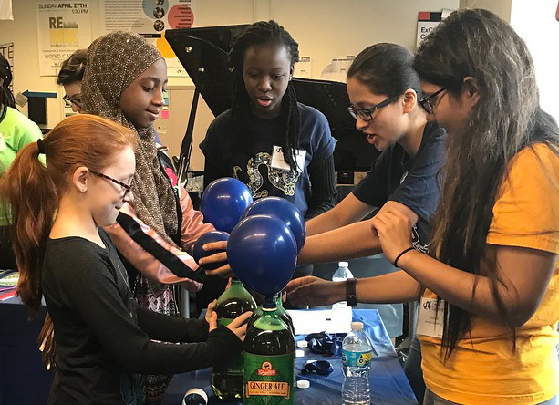 Girls learn about engineering.