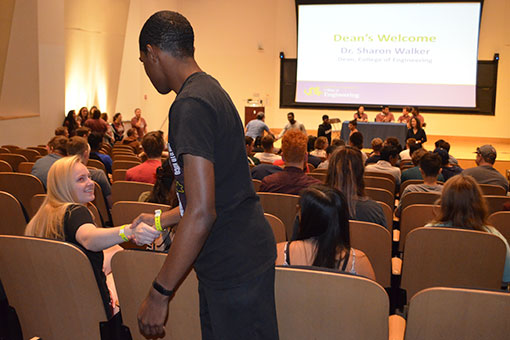 Dean Walker encouraged students to greet one another.