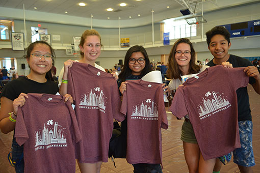 New students show off their t-shirts.