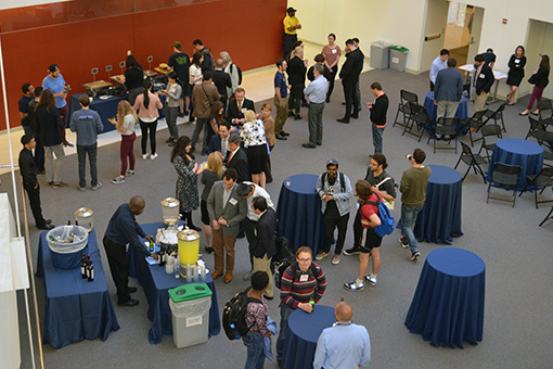 Guest gathered in the atrium of the Bossone Research Enterprise Center.