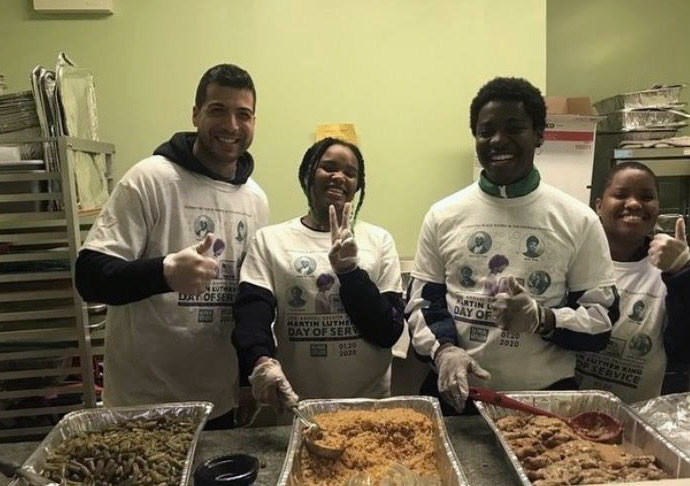 Group of students volunteering at community kitchen