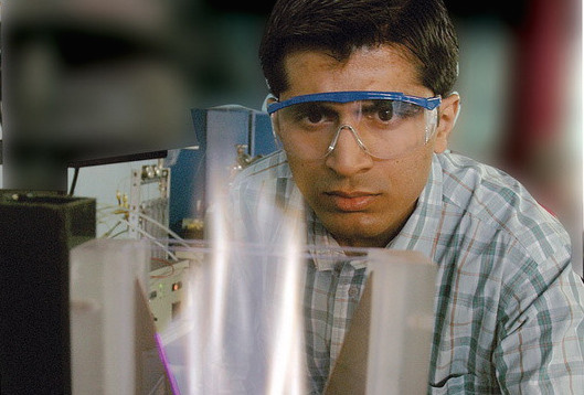 Student in plasma lab