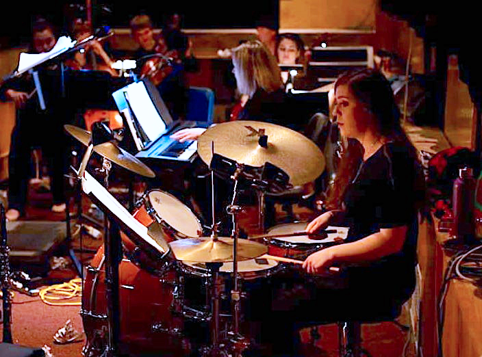 Vitale at a drum kit.