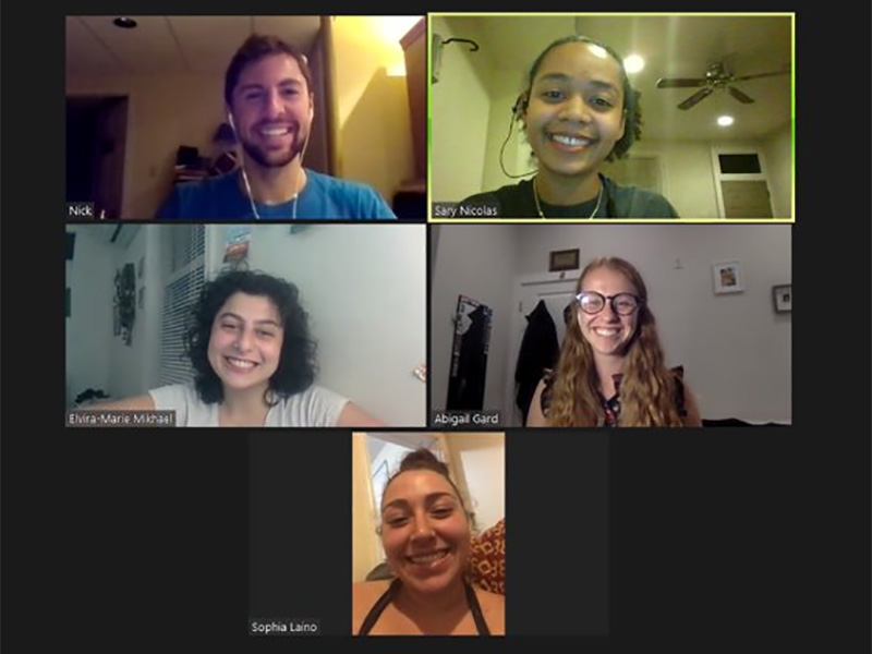 Faces of students in a Zoom meeting