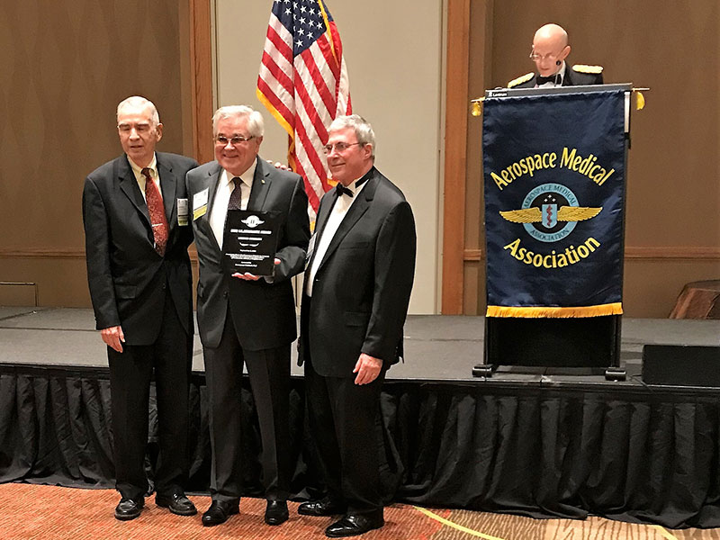 Man receiving an award