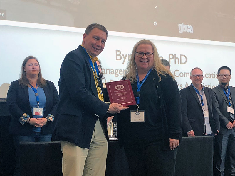 Woman receiving an award