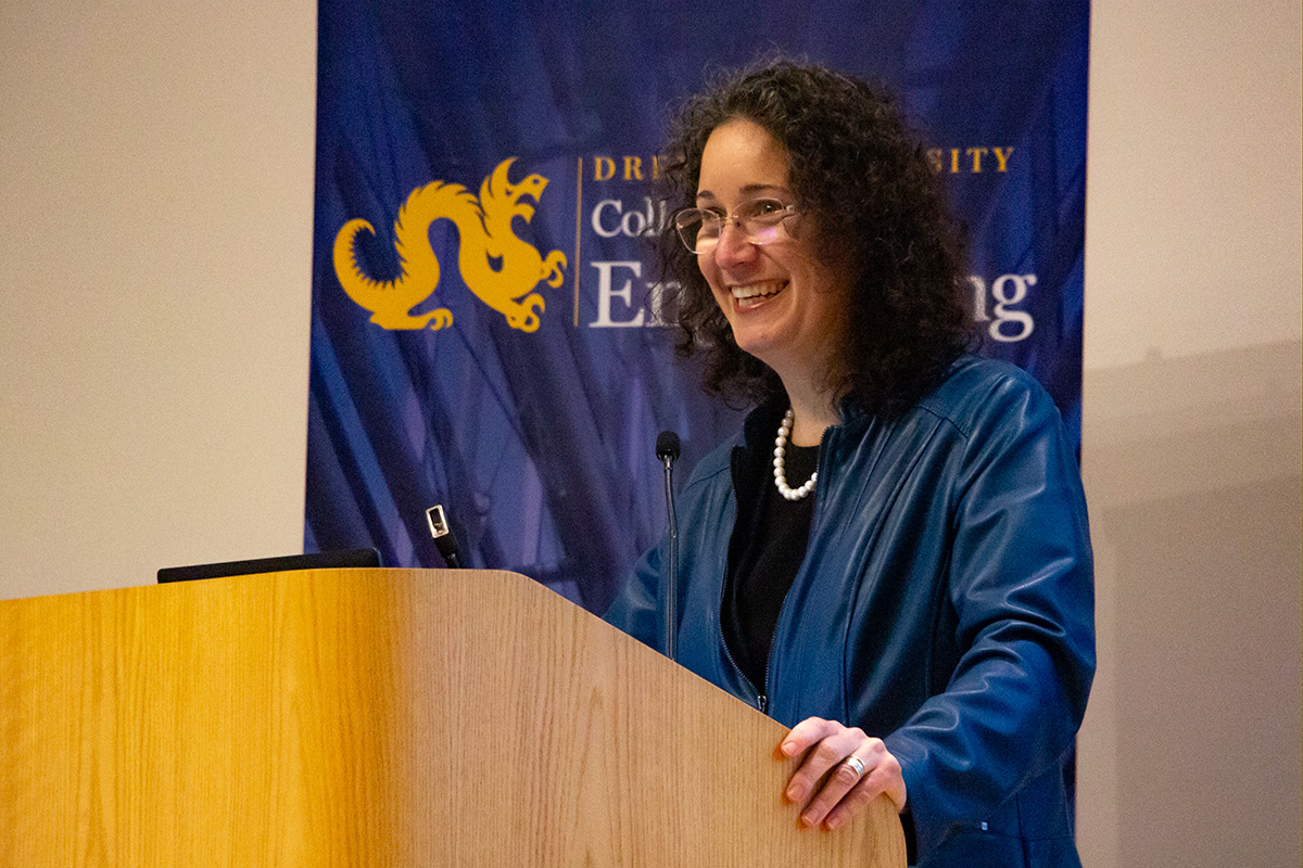 Dean Walker speaks at a podium