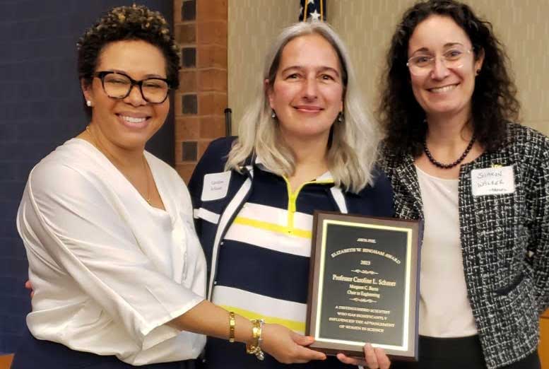 Schauer accepts awards with Dean Walker from Drexel University