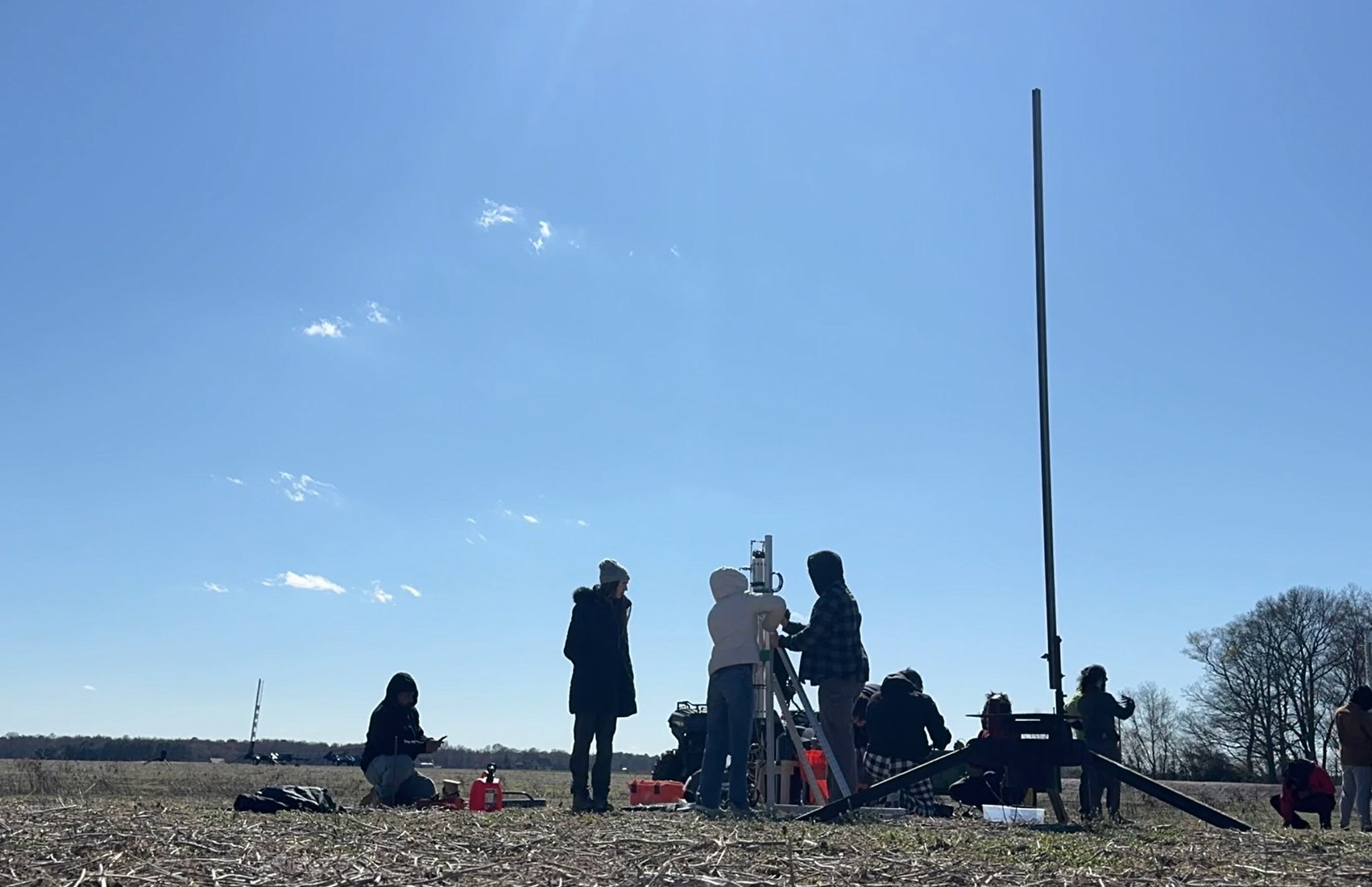 The team fixes their rocker to the launch device.