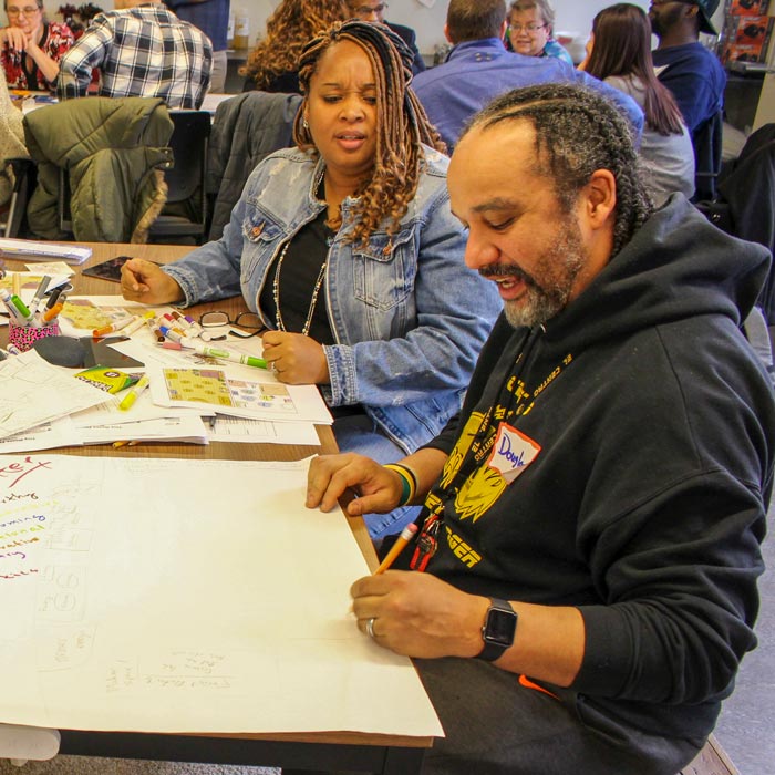 people working at table