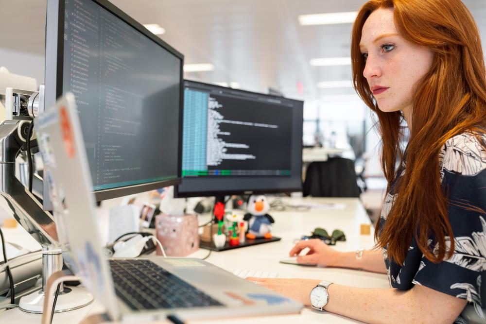 woman at computer coding