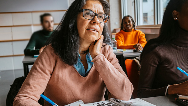 an adult learner participating in an enthralling writing class