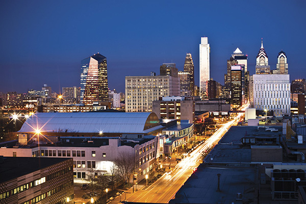 a view of the philadelphia skyline at night