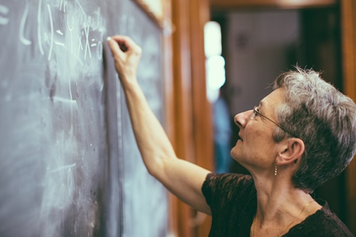 Instructor Writing on Blackboard