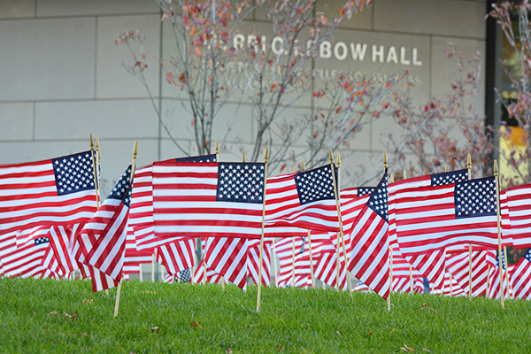 Veterans Day flags in front of Gerri C. LeBow Hall