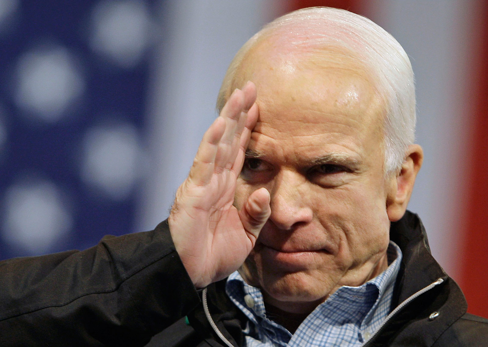 Image of John McCain saluting